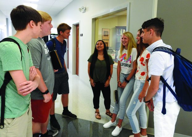Gray Stone Day School seniors discuss the new year and the school's new schedule. From left are Corbett Wesley, Wesley Huneycutt, Cameron Pierson, Victoria Vang, Taylor Query, Chistina Gentile and Connor Morin.